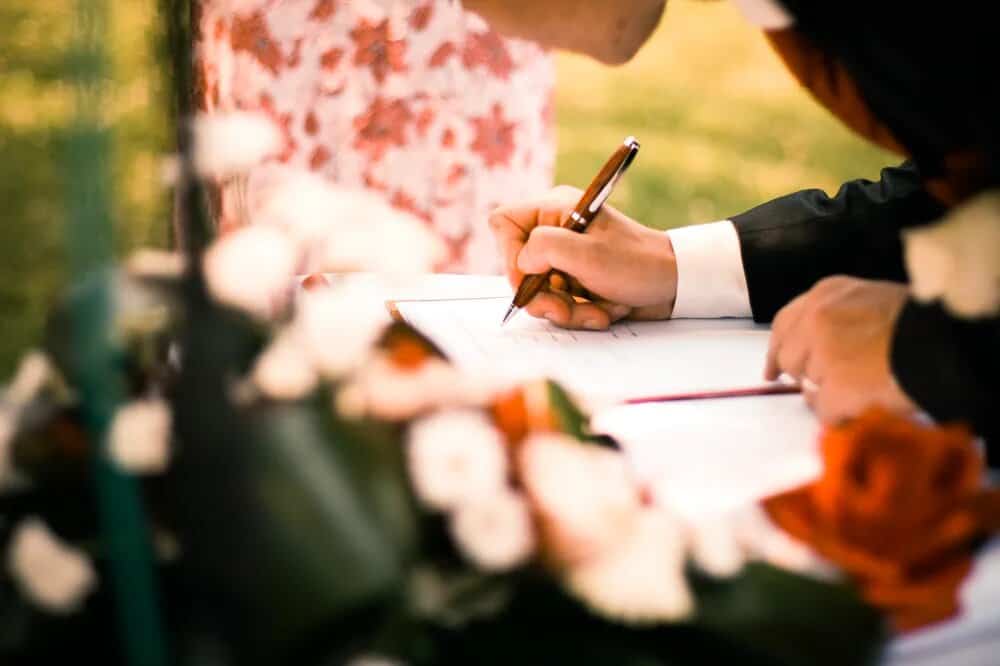 signing guest book at a wedding